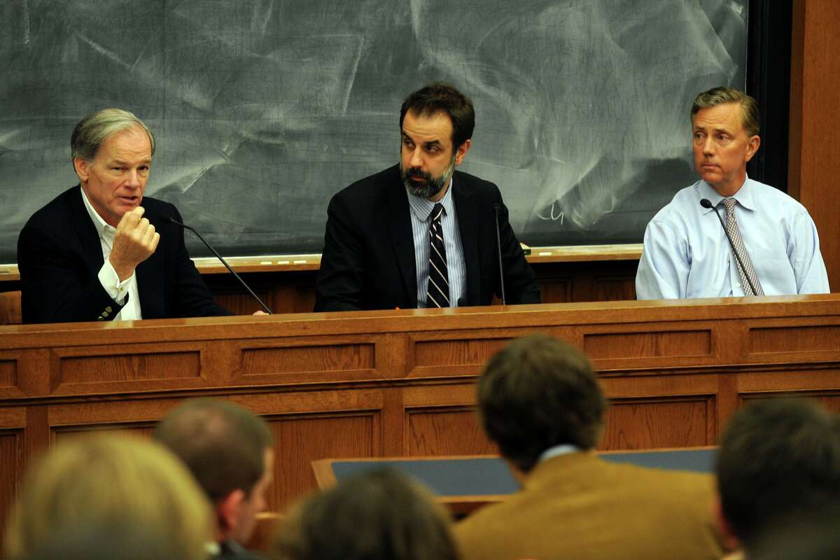 John Dankosky of WNPR moderates a 2011 debate between Tom Foley (left), and Ned Lamont at the Yale Law School.