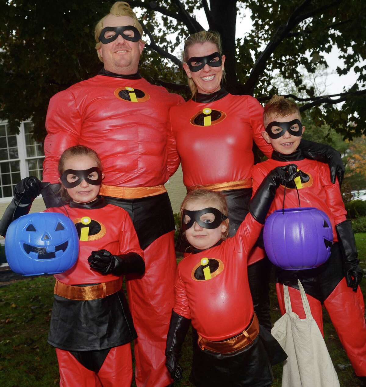 The Smith family of Wilton; dad Mark, mom Alison and their kids, Emily, Bennett, and Harper, dressed as the Incredibles during the Wilton Chamber of Commerce’s annual Pumpkin Parade and Trick-or-Treat Saturday, October 27, 2018, in Wilton Conn.