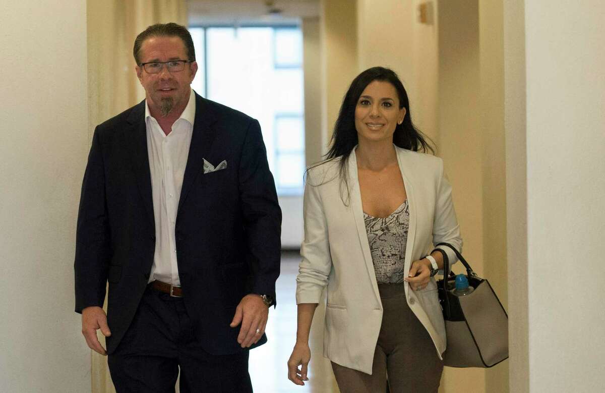 Former Houston Astros player and Hall of Famer Jeff Bagwell arrives the Harris County Family Law Center with wife, Rachel Bagwell, for the opening of his case before Harris County District Judge Latosha Lewis Payne on Tuesday, Sept. 24, 2019, in Houston. F&G Landscape Inc. alleged that the former Astros first baseman owes them $175,800 for work done at Bagwell's $4.8 million home in the Memorial area.