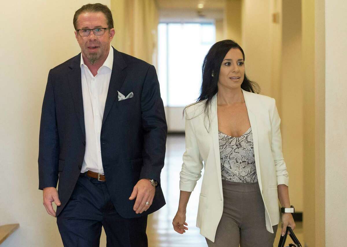 Former Houston Astros player and Hall of Famer Jeff Bagwell arrives the Harris County Family Law Center with wife, Rachel Bagwell, for the opening of his case before Harris County District Judge Latosha Lewis Payne on Tuesday, Sept. 24, 2019, in Houston. F&G Landscape Inc. alleged that the former Astros first baseman owes them $175,800 for work done at Bagwell's $4.8 million home in the Memorial area.