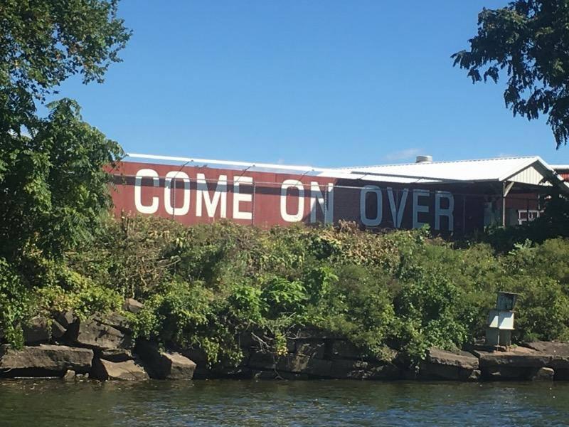 Portland’s ‘Come on Over’ sign emerges from the overgrowth