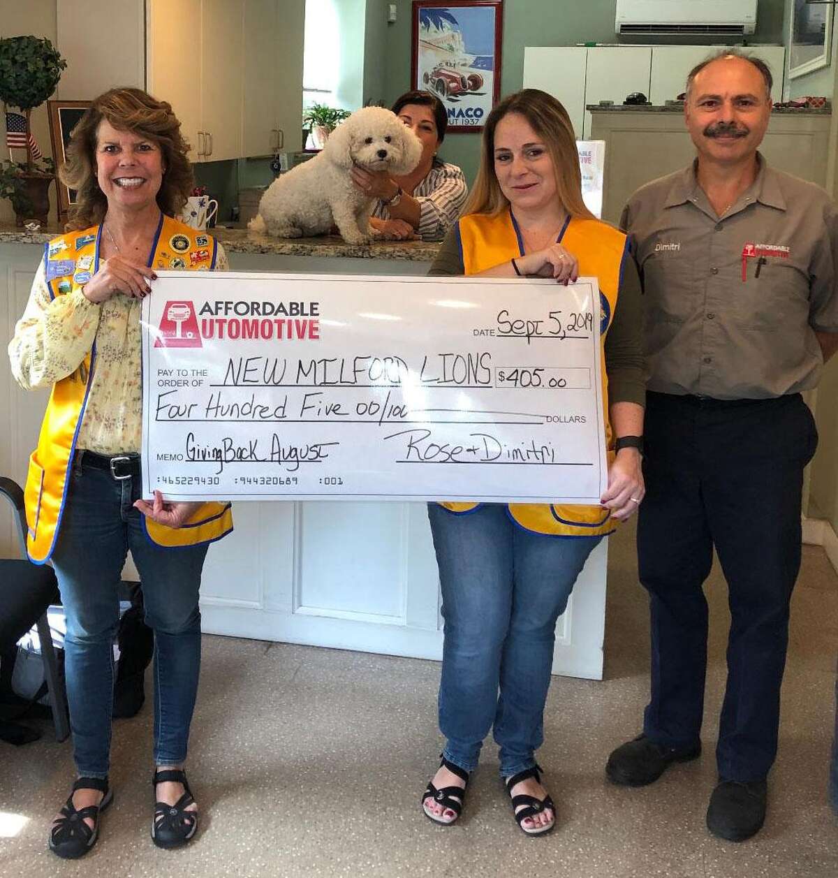The New Milford Lions Club recently received a check for $405 from Affordable Automotive. The donation was made through the business' Giving Back Program. Each month, Affordable Automotive gives $5 per oil change to a local organization. For August, the business performed 81 oil changes, thus the club received $405. Above are, from left to right, Lions President Tammy Deak, Affordable Automotive co-owner Rose Koulouris, Lion Helena Short and Affordable Automotive co-owner Dimitri Koulouris.