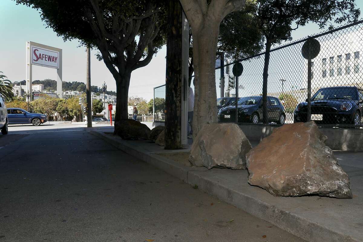 Boulders line the street of Clinton Park just off of Dolores St. on Tuesday, 9 24, 2019, in San Francisco, Calif. Someone has put boulders up on the sidewalk to keep the homeless tents out and the Department of Public works has no plans to remove them.