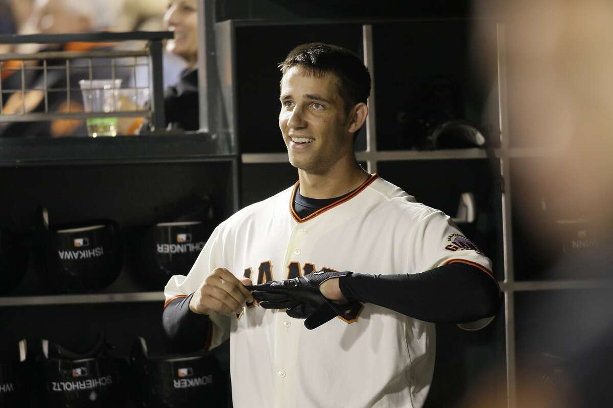 Madison Bumgarner and Buster Posey by Jamie Squire