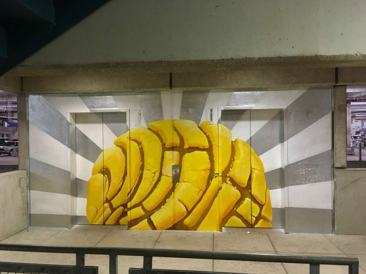Local artist Eva Marengo Sanchez, 29, painted "The Rise of the Concha" on a set of elevator shaft doors located on Level 2 of the parking garage at the San Antonio International Airport. 
