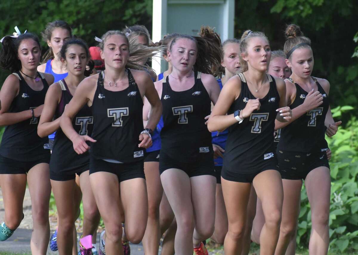 Trumbull's girls cross country team is unbeaten and ranked fourth in the state.