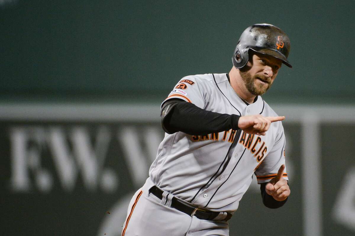BOSTON, MA - SEPTEMBER 18: Stephen Vogt #21 of the San Francisco Giants reacts after hitting a home run against the Boston Red Sox in the first inning at Fenway Park on September 18, 2019 in Boston, Massachusetts. (Photo by Kathryn Riley/Getty Images)