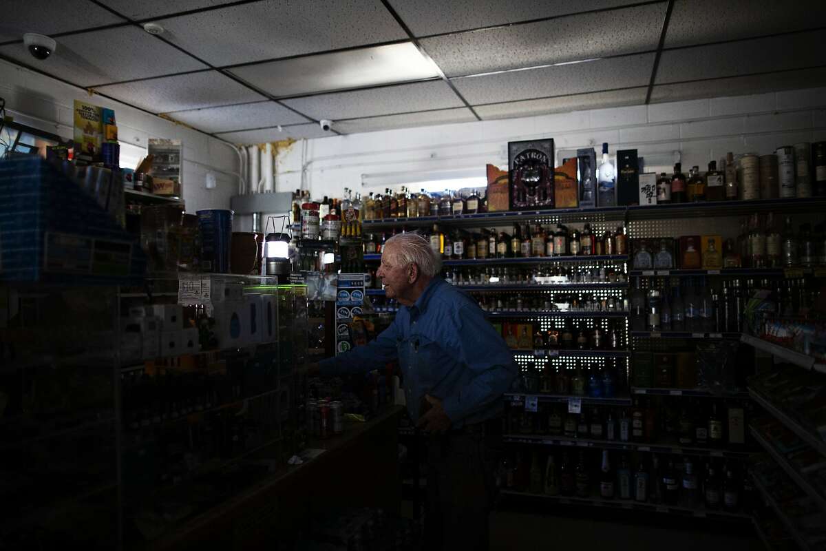 John Pelkan, a local wine maker buying beer and soda for his crew during harvest at the Calistoga Liquor store during a power outage that PG&E is doing attempts to prevent fire during extreme fire conditions, Calistoga, September 25th, 2019. PG&E shut off electricity to parts of Calistoga in attempts to prevent fire started by their lines during extreme fire conditions. The first report of the Tubbs Fire came from Hwy 128 and Tubbs lane -where Calistoga Liquor store is located.