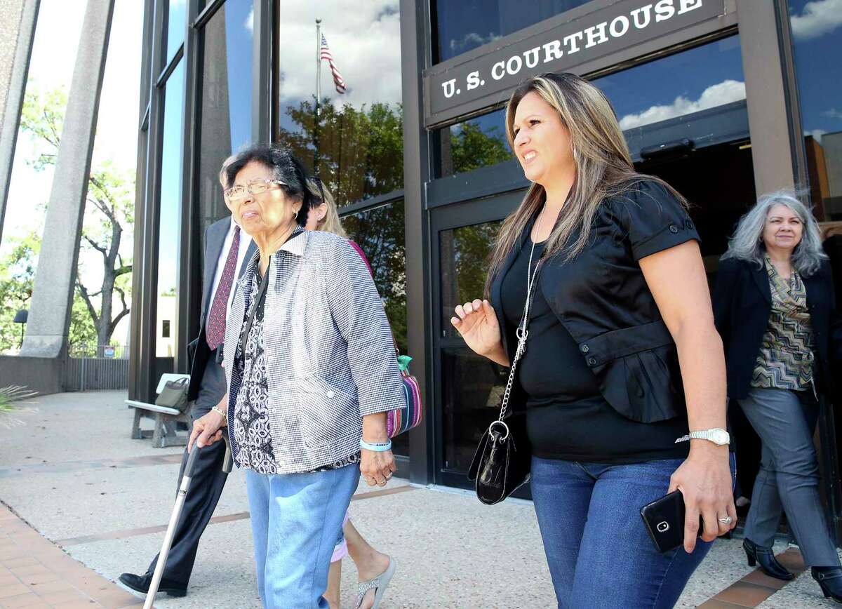 Maggie Vidal and her daughter-in-law Teresa Vidal leave the building as victims and relatives from the Sutherland Springs massacre gather outside the Federal Courthouse after an initial hearing on their lawsuit against the Air Force on Sept. 25, 2019.