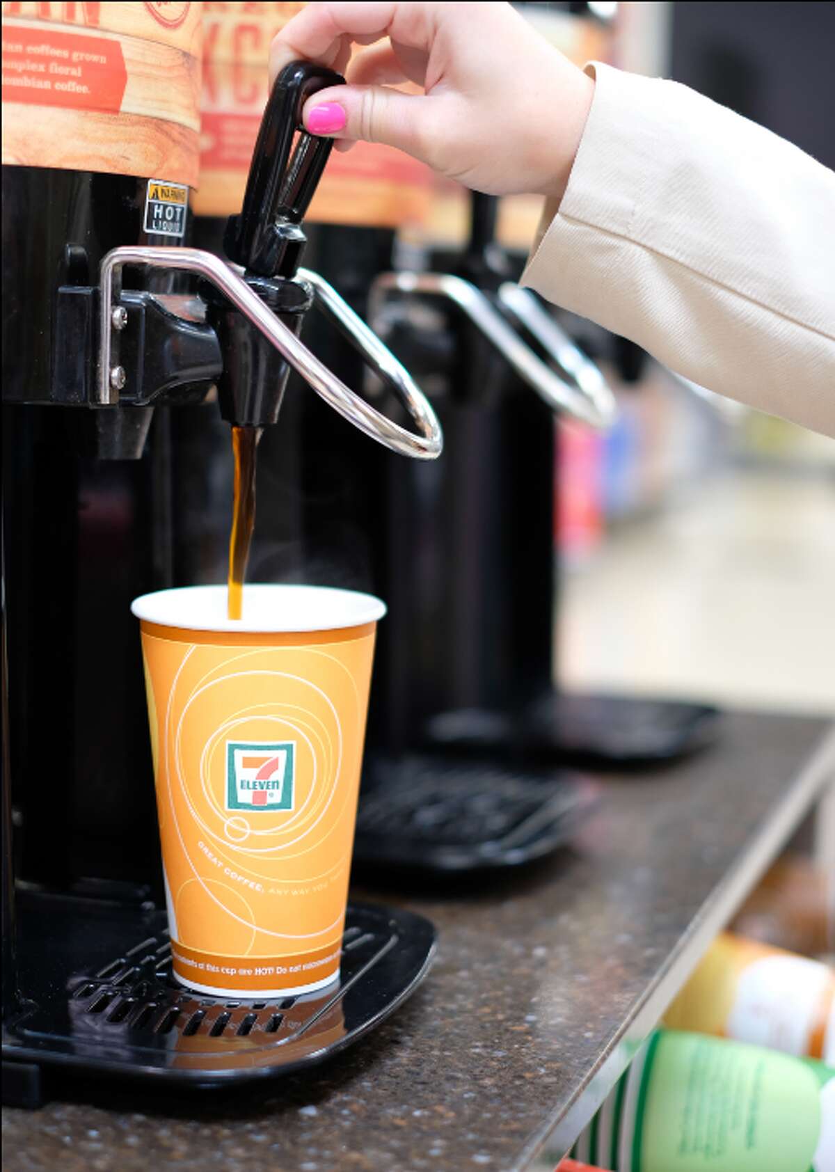 7-Eleven Even the chain of convenience stores is getting in on the action. All 7-Elevens scattered throughout the city are doling out a $1 any size coffee through the free 7Rewards app.