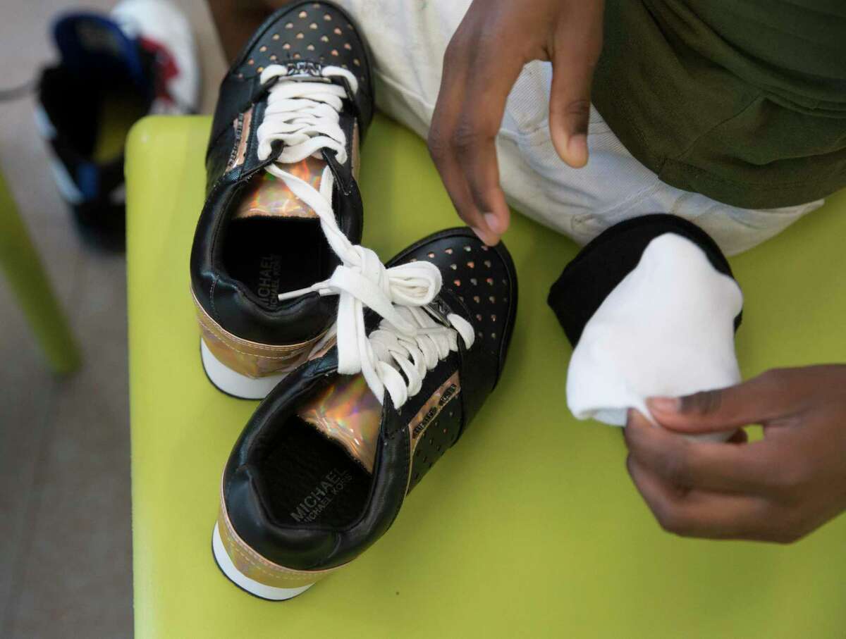 Kids living at the new Women & Family Development Center at Star of Hope’s Cornerstone Community pair up with volunteers to find a pair of shoes to start the 2019-2020 school year in Houston. At this event, more than 150 homeless children received a pair of shoes. The Houston metro region’s poverty rate increased in 2018 to 14.3 percent, according to Census data released Thursday.