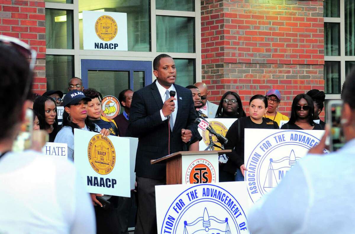 State Senator George Logan speaks during a rally held by the NAACP before the start of the Shelton Board of Education meeting at Shelton Intermediate School on Sept. 25. The Valley NAACP President Greg Johnson, Sr. says the school's reaction was inadequate after two middle school children dressed up in blackface recently.