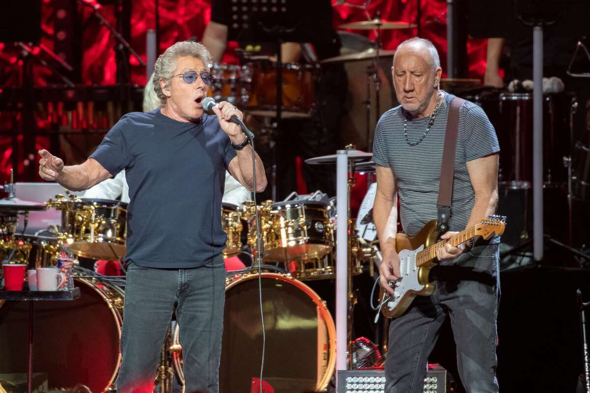 Roger Daltrey (L) and Pete Townshend of British rock band "The Who" perform at the Toyota Center on the second leg of their Moving On! tour on September 25, 2019 in Houston, Texas. (Photo by SUZANNE CORDEIRO / AFP) (Photo credit should read SUZANNE CORDEIRO/AFP/Getty Images)