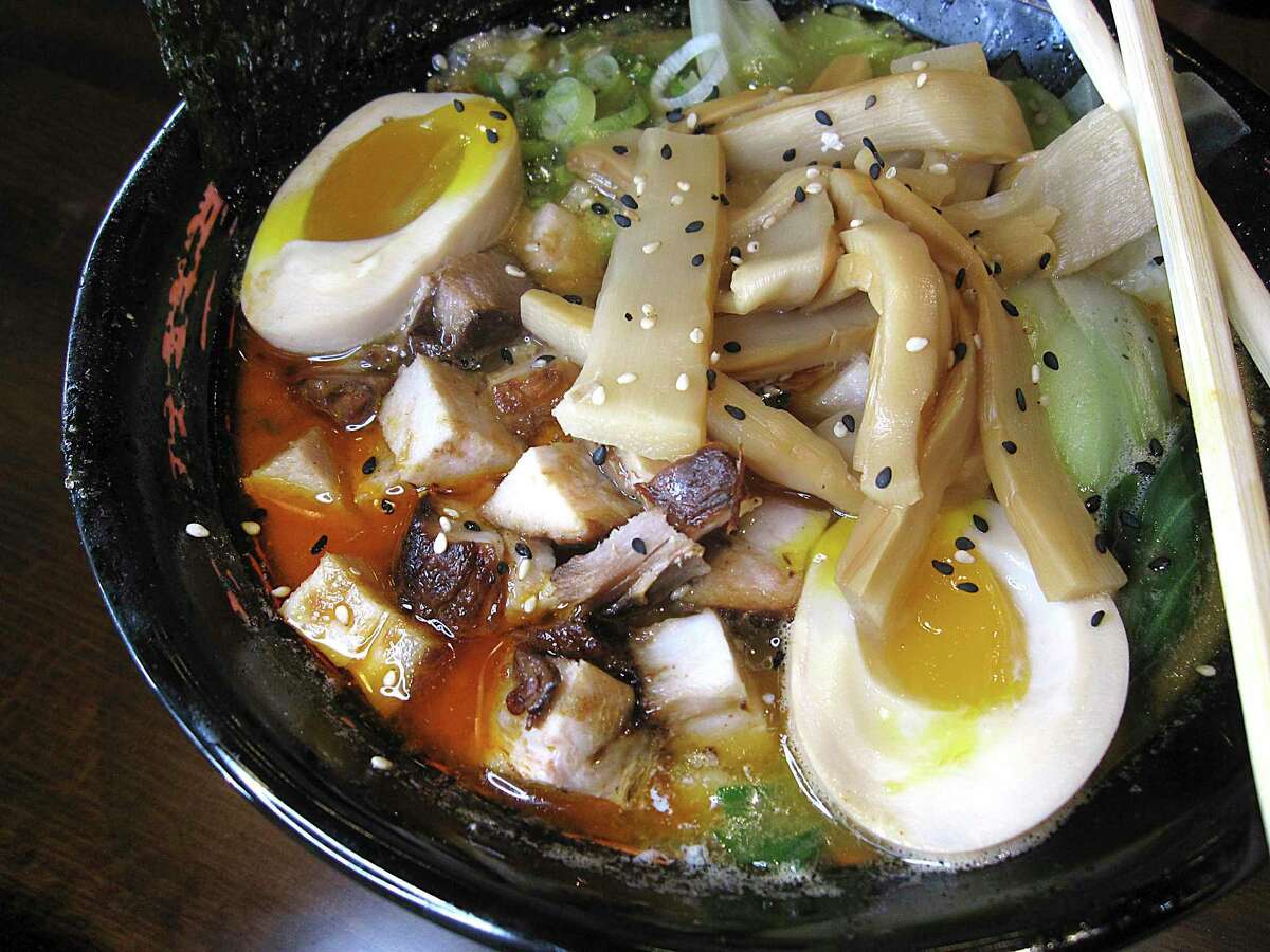 Spicy umami miso is a pork broth ramen with diced pork, seasoned egg, bok choy and an add-on of bamboo shoots at Bakudan Ramen.