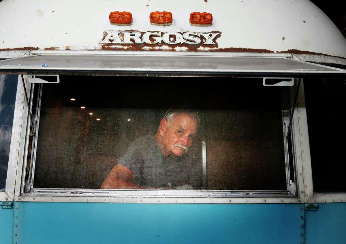 Larry Williams inside his latest trailer project for Go Vintage Trailers, his San Antonio-based business that renovates and rents out vintage travel trailers.