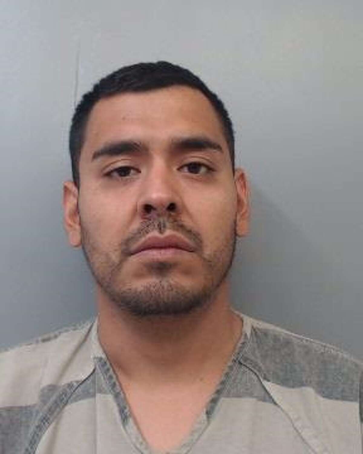 Martin Salvador Licea Rosales, 25, was charged with assault, family violence.