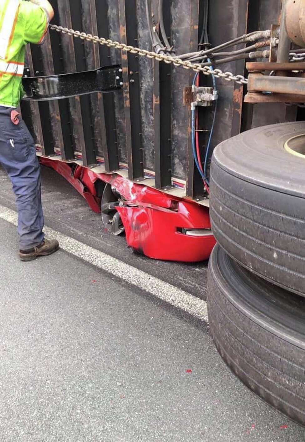 Trapped in flattened car on I787, man suffers just a scratch