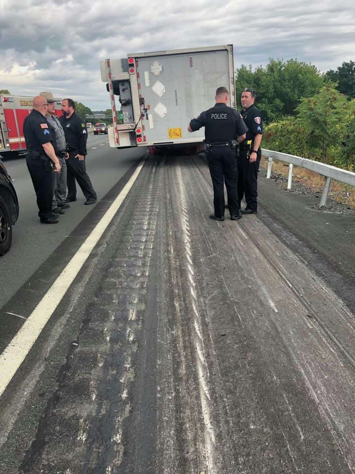 Trapped in flattened car on I787, man suffers just a scratch