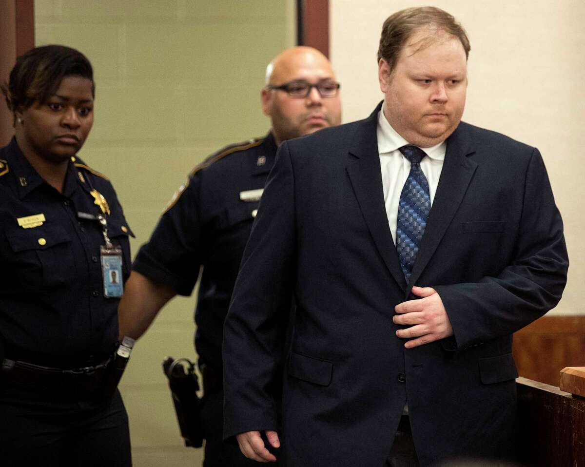 Ronald Haskell is led into the courtroom to hear the verdict in his capital murder trial on Thursday, Sept. 26, 2019, in Houston. Haskell was convicted of capital murder of Katie and Stephen Stay in connection with the 2014 massacre of the Stays and four of their children.