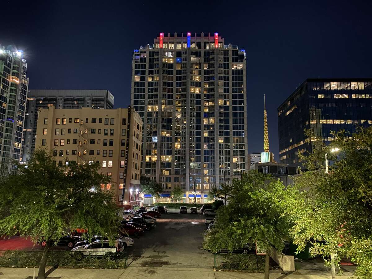 The Skyhouse Houston apartment high-rise, 1725 Main St., is seen from the Tellepsen YMCA parking garage, shot using Night Mode on the iPhone 11 Pro Max.