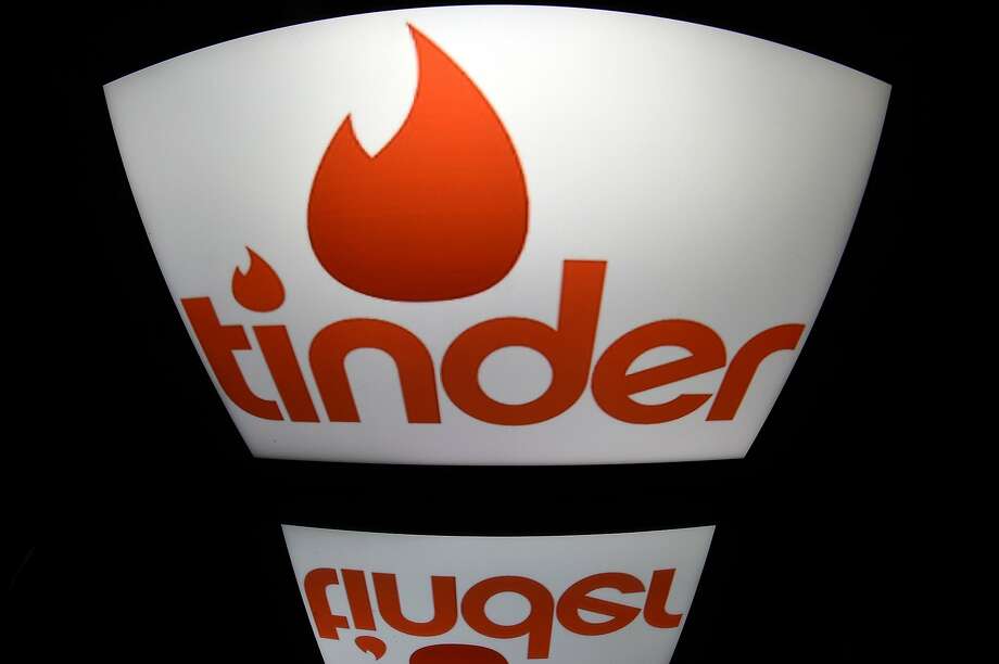 Match Group owns Tinder, OkCupid and other dating sites in addition to Match.com. Photo: Lionel Bonaventure / AFP / Getty Images