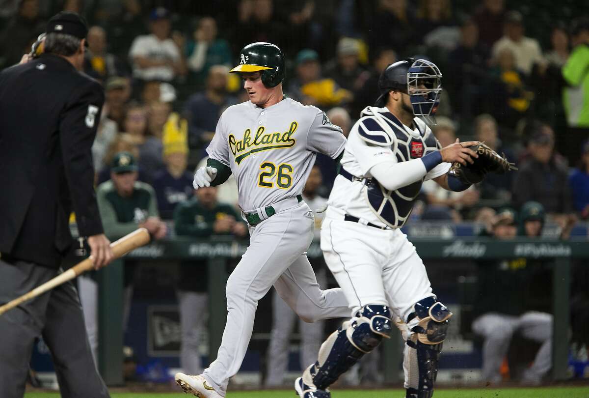 SEATTLE, WA - SEPTEMBER 26: Matt Chapman #26 of the Oakland Athletics scores in the first inning against the Seattle Mariners at T-Mobile Park on September 26, 2019 in Seattle, Washington. (Photo by Lindsey Wasson/Getty Images)