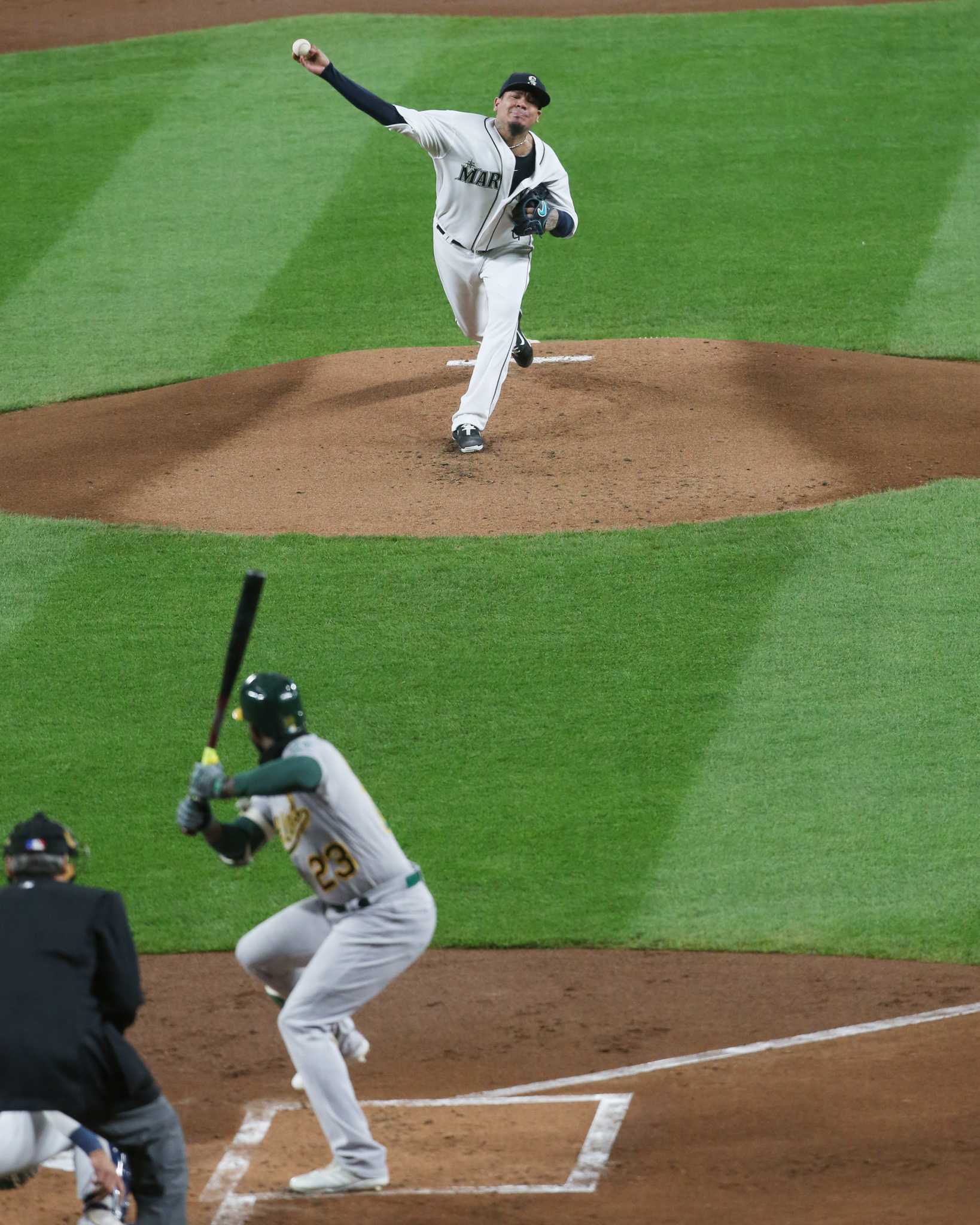 The Prince throws the first pitch to his dad, King Felix, as the Mariners  celebrate Father's Day