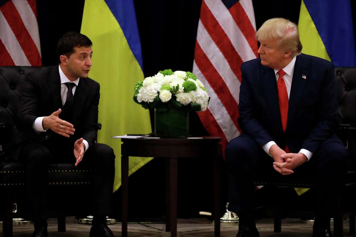 President Donald Trump meets with Ukrainian President Volodymyr Zelenskiy in New York on Wednesday. The White House has released a transcript of their July phone call where Trump asks Zelenskiy for a favor: that he find information that would be hurtful to Democratic presidential hopeful Joe Biden and his son Hunter.