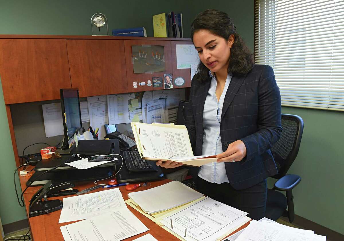 Azin Ahmadi, an immigration attorney, is seen in her office at The Legal Project Office on Friday, Sept. 27, 2019 in Albany, N.Y. Ahmadi runs a program that focuses on providing resources to muslim immigrants who are domestic violence survivors. (Lori Van Buren/Times Union)