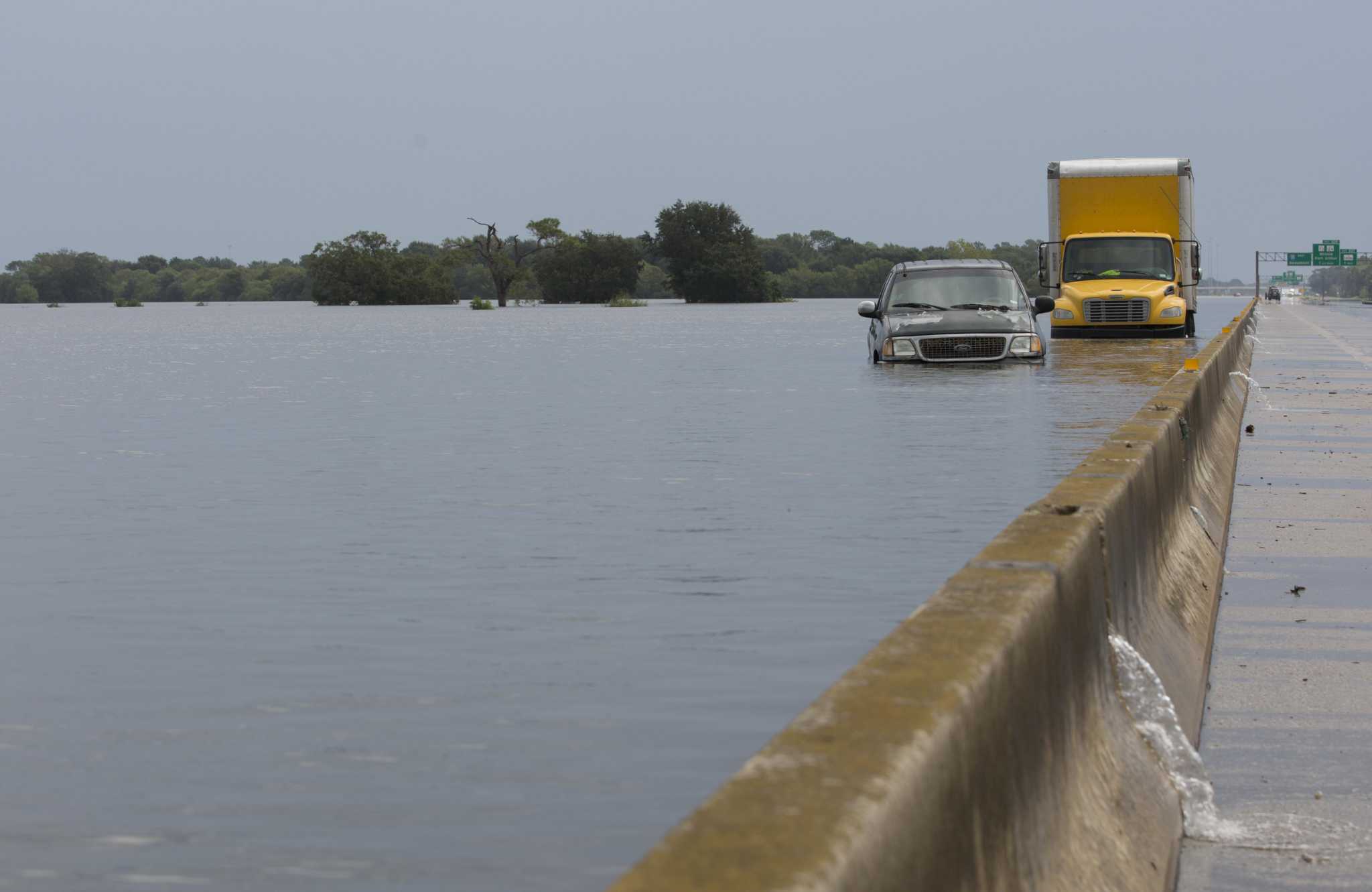 Fed up with flooding, Winniearea families sue Texas over highway