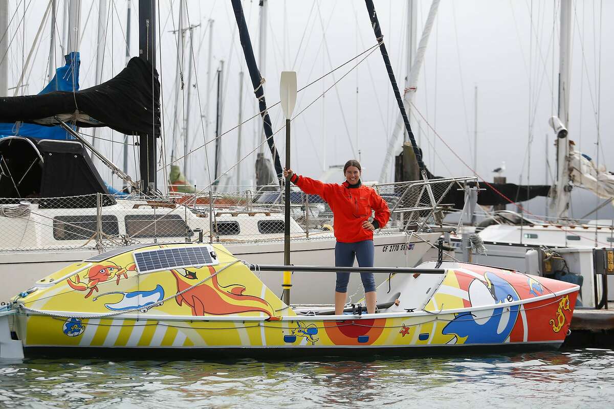 Long-distance ocean rower Lia Ditton with her boat at Travis Marina in Sausalito in 2019.