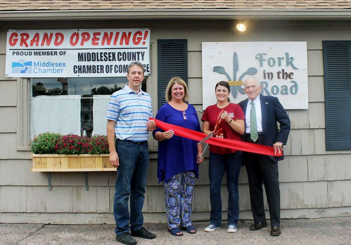 Fork in the Road held a grand opening at 310 Saybrook Road in Higganum center Thursday. From left are Robert Lloyd of TechNet Computing, First Selectwoman Lizz Milardo, owner Lori Lloyd and Middlesex Chamber President Larry McHugh.