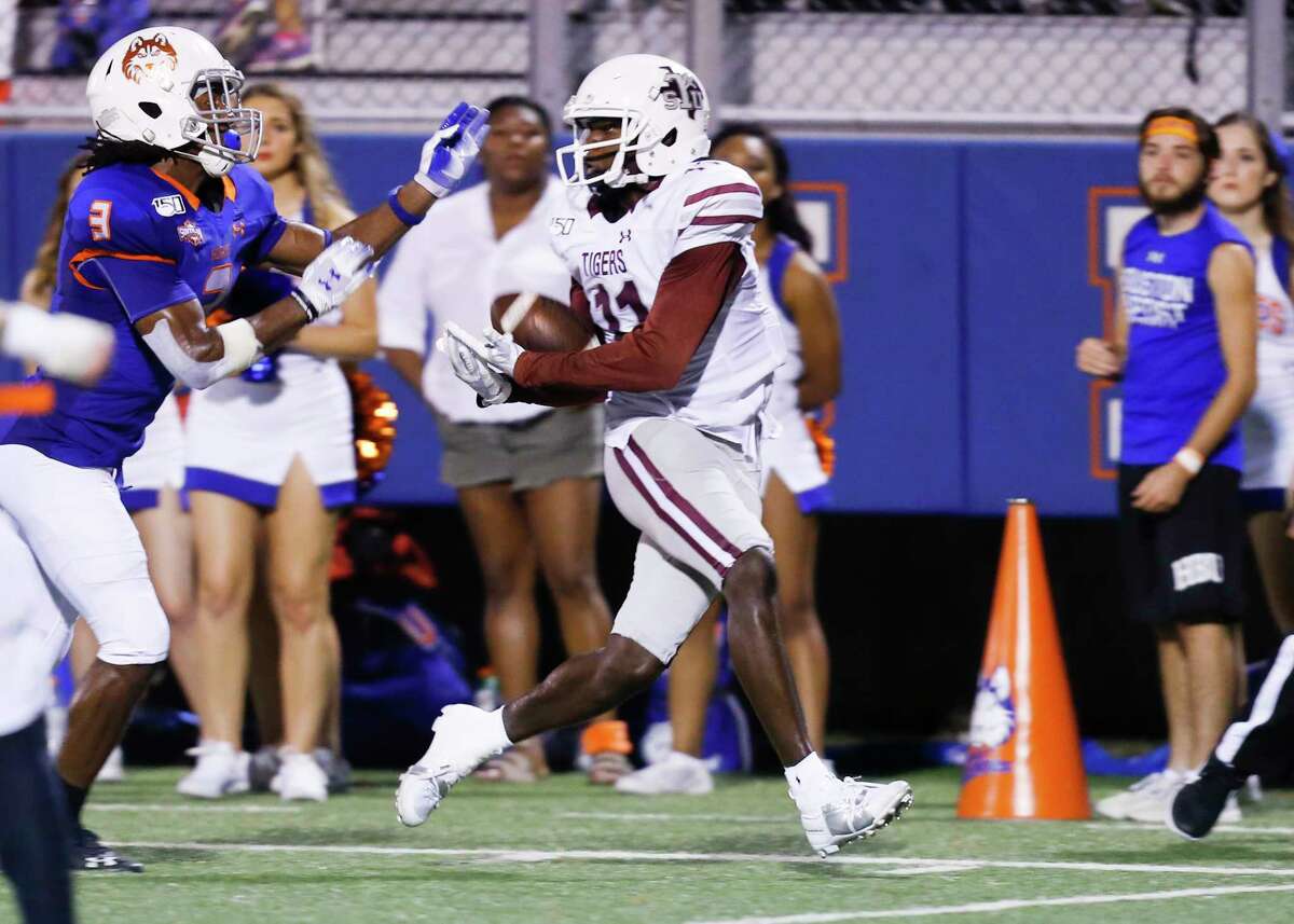 Texas Southern Tigers wide receiver Tren'Davian Dickson (11) catches a pass for a touchdown over Houston Baptist Huskies cornerback Alfred King (3) in the second quarter of game action on Saturday, Sept. 28, 2019 in Houston.