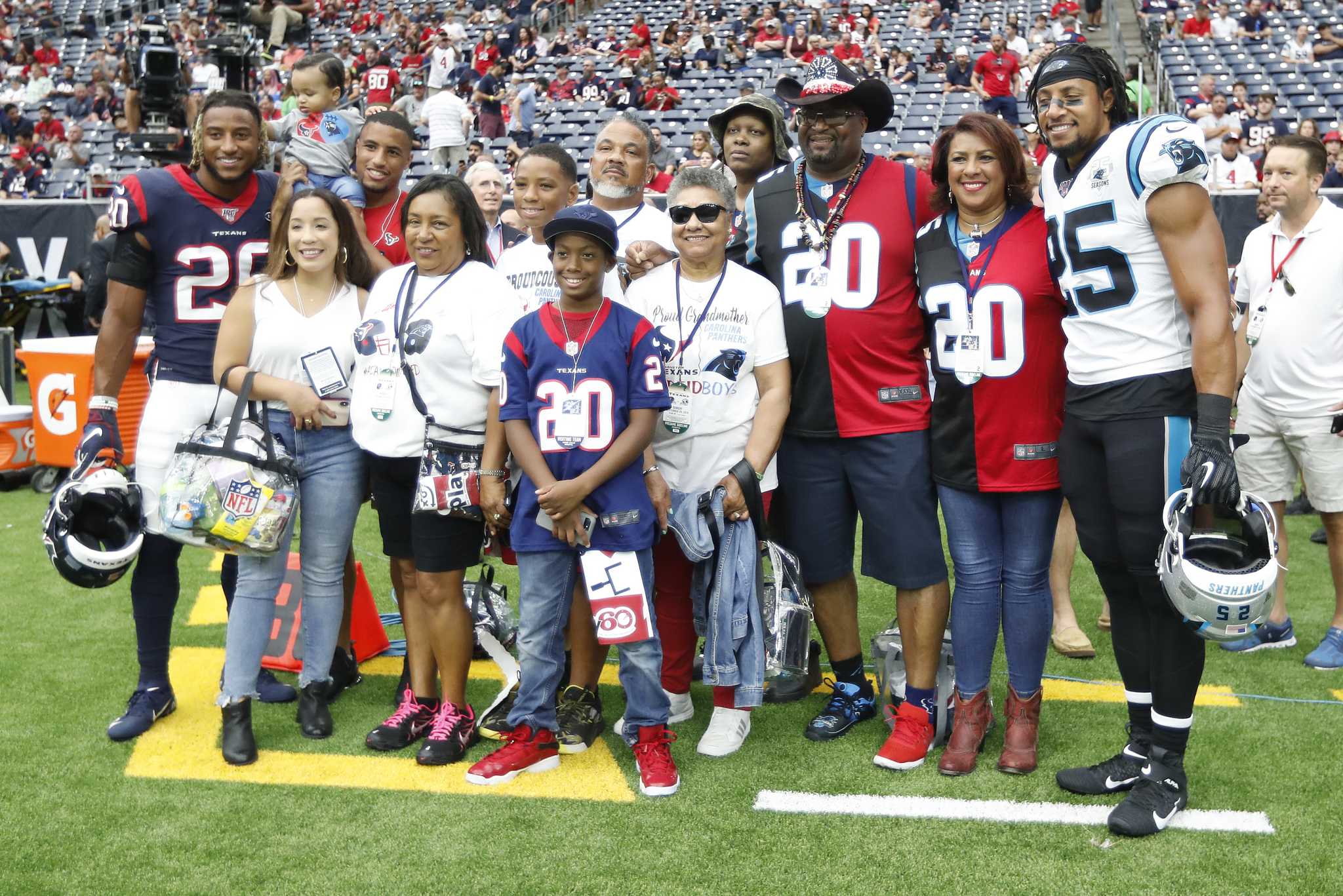 Panthers salute service members; safety Eric Reid kneels during anthem