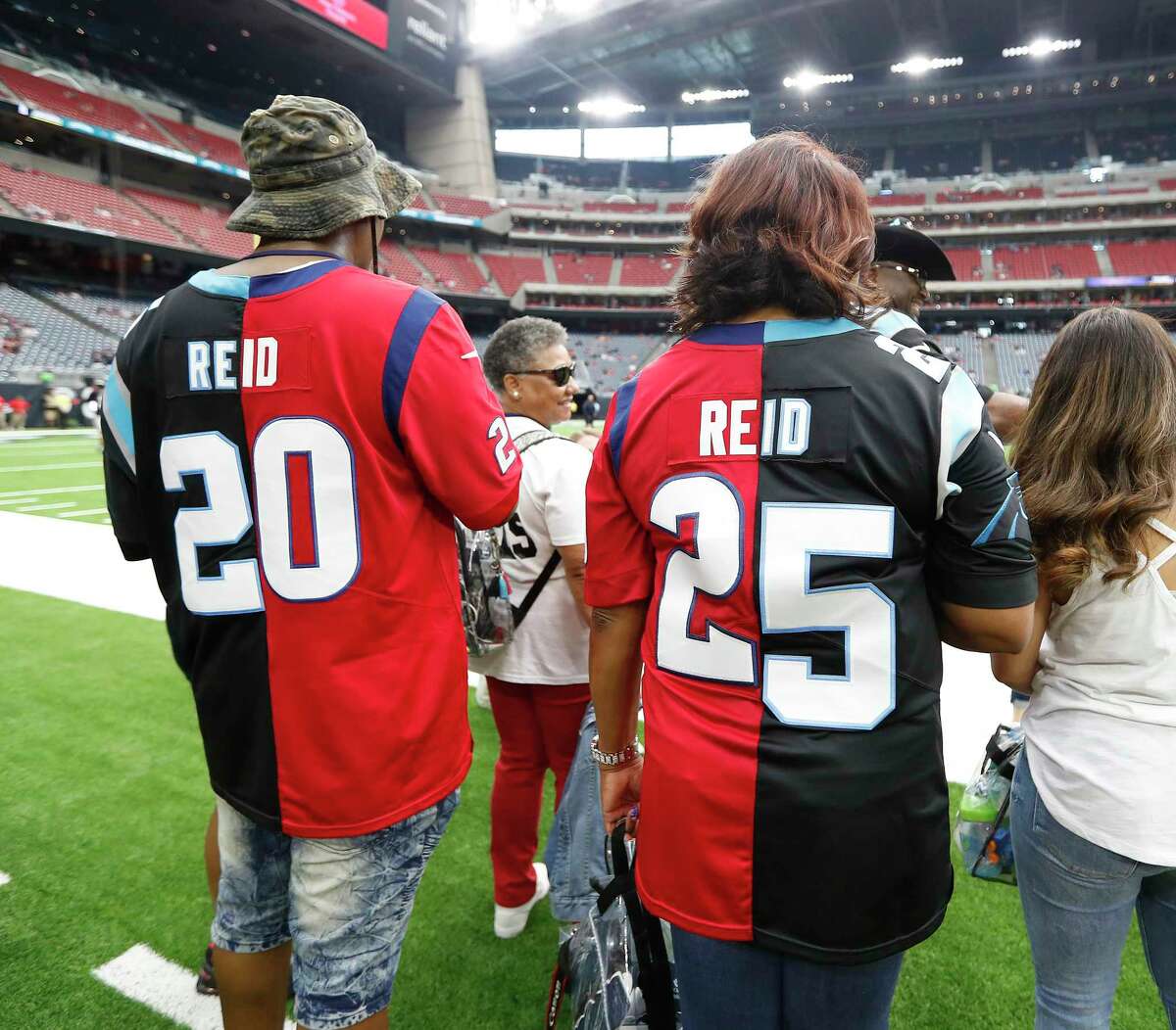 Family of Justin, Eric Reid split allegiances at Texans-Panthers game
