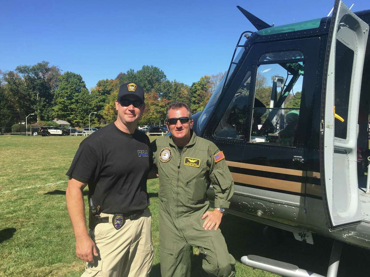 Ridgefield police Chief Jeff Kreitz with Eagle One's pilot Tom O'Halloran at Safety Day, Sunday Sept. 29.