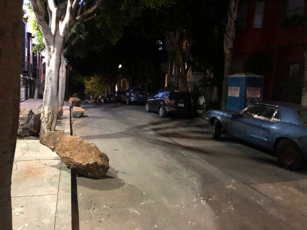 Several of the boulders placed in a San Francisco alley as a way to deter homeless encampments and drug dealing were rolled back into the street by early Sunday.