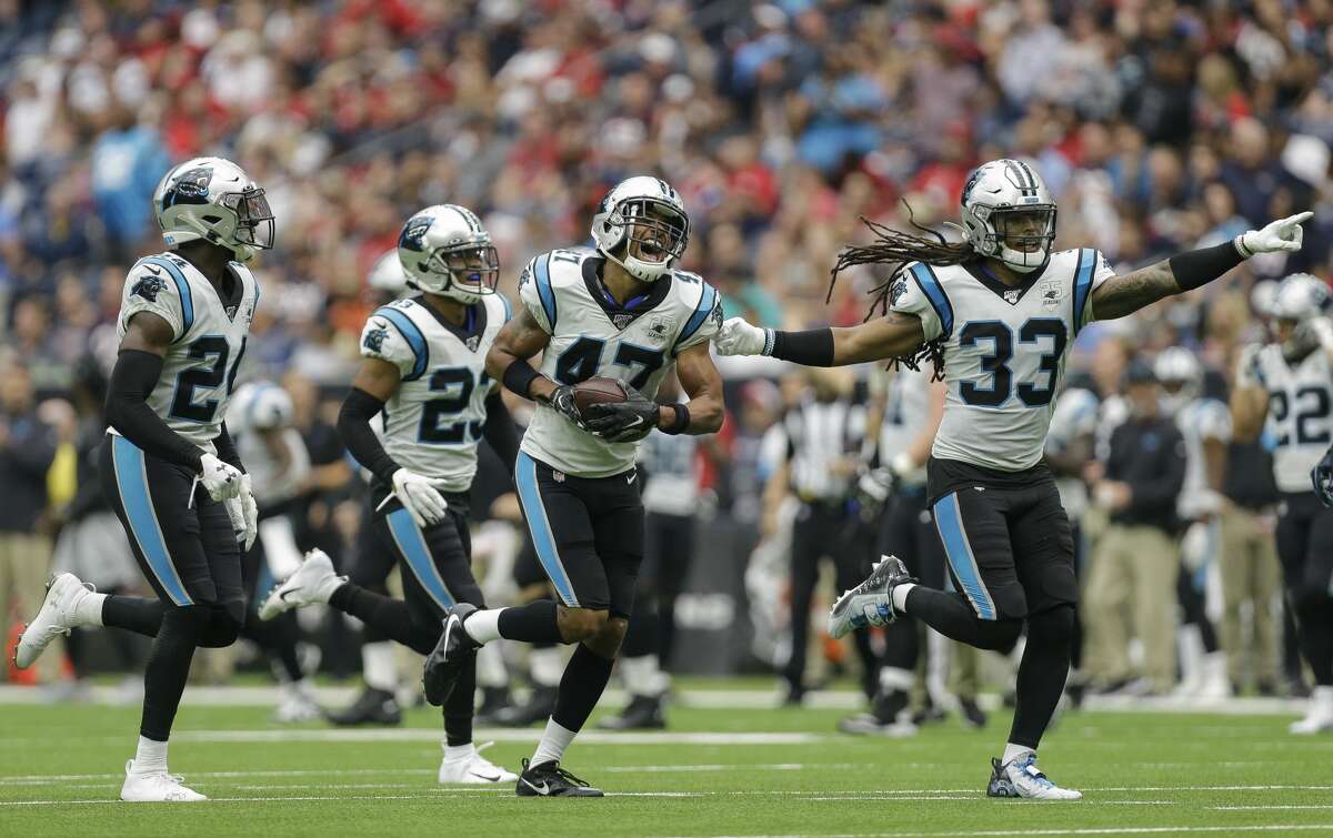 Carolina Panthers defensive back Ross Cockrell (47) celebrates with teammates after intercepting the ball against the Houston Texans during the second quarter of an NFL game at NRG Stadium Sunday, Sept. 29, 2019, in Houston.