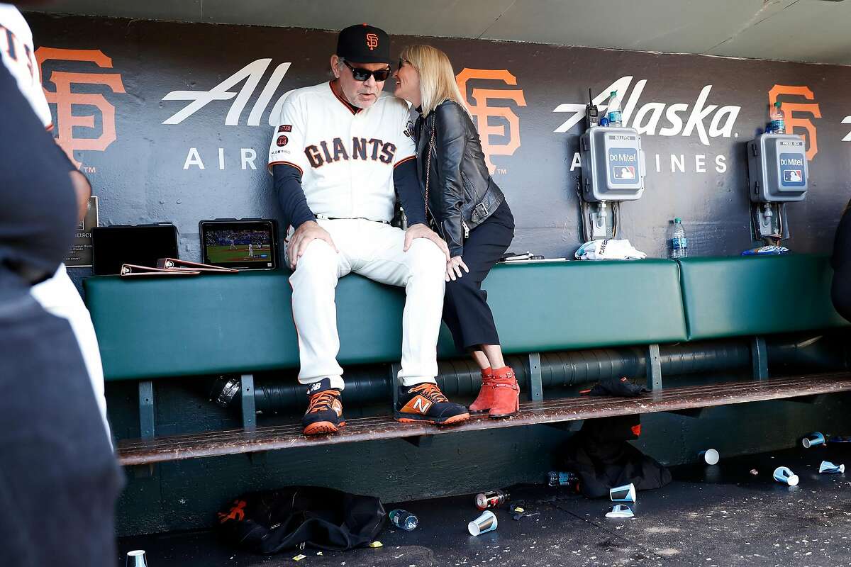 Joe Girardi and his wife Kim pose after he was introduced as the