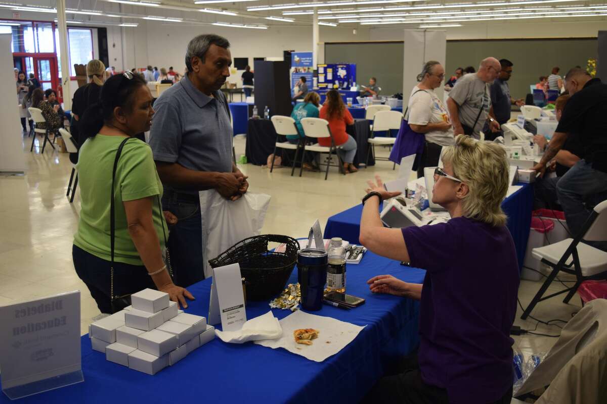 Guests browse the health fair during the 2018 event.