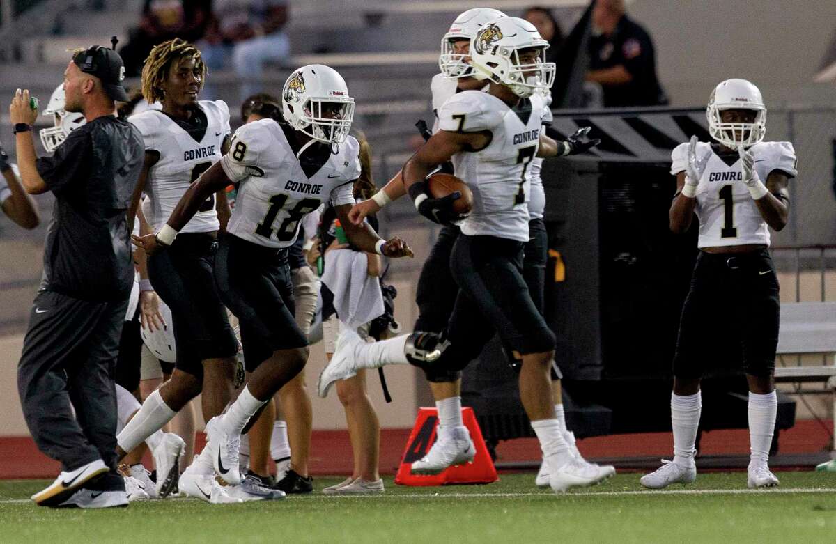 Conroe defensive back Alex Morrison (7) reacts after intercepting a pass during the second quarter of a District 15-6A high school football game at Klein Memorial Stadium, Saturday, Sept. 28, 2019, in Spring.