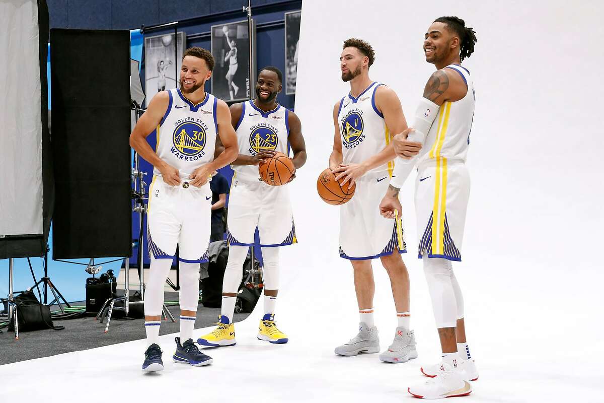 Draymond Green (23) Stephen Curry (30), Klay Thompson (11) and D'Angelo  Russell (0) during media day for the Golden State Warriors at Chase Arena  in San Francisco, Calif., on Monday, September 30