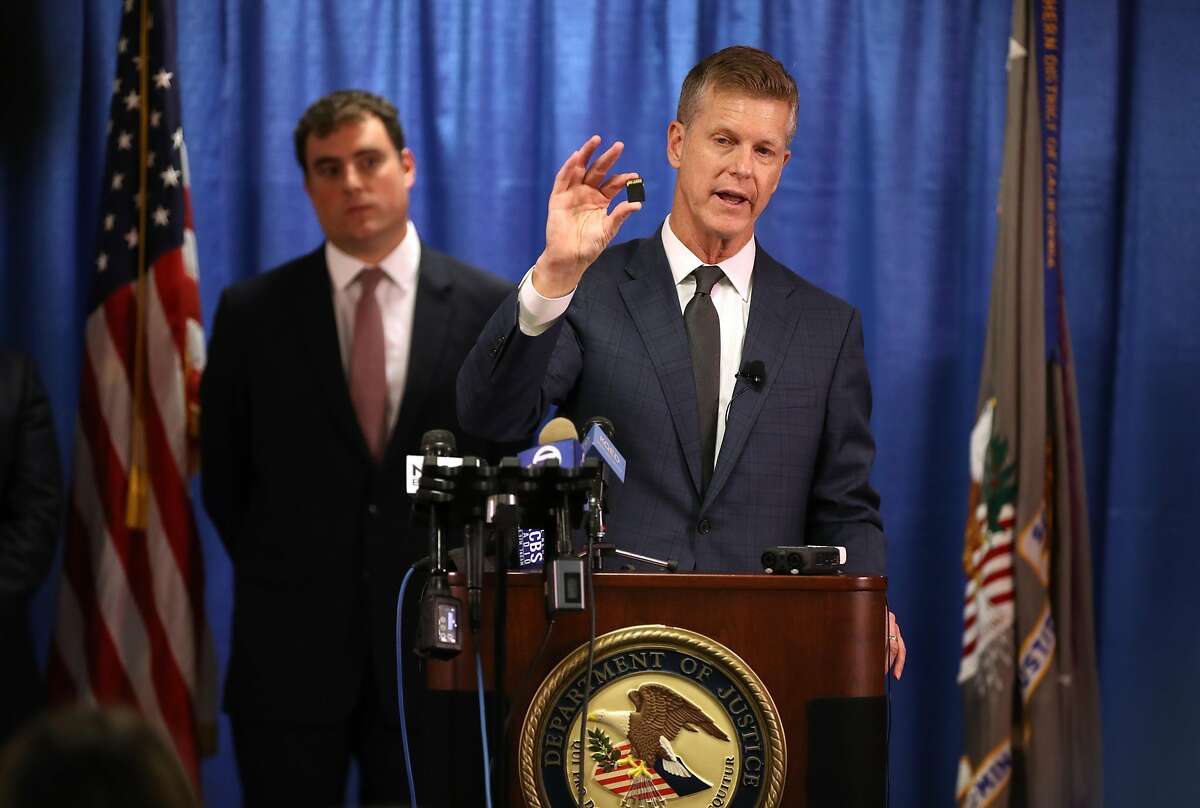 SAN FRANCISCO, CALIFORNIA - SEPTEMBER 30: United States attorney David L. Anderson holds an SD memory card as he speaks during a news conference on September 30, 2019 in San Francisco, California. The U.S. attorney's office of the Northern District of California announced a criminal complaint against Xuehua Peng, also known as Edward Peng, for acting as an illegal foreign agent that allegedly delivered classified U.S. national security information to the government of the People's Republic of China's Ministry of State Security. (Photo by Justin Sullivan/Getty Images)