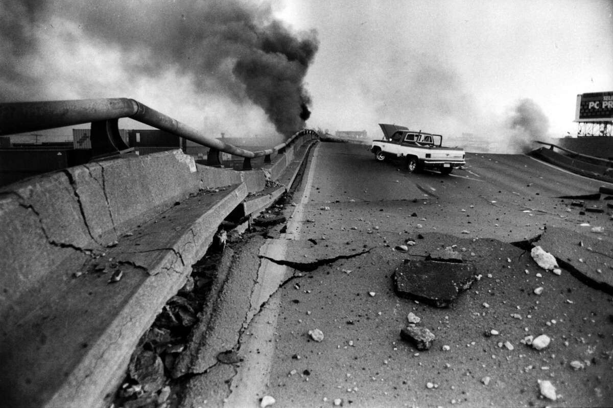 Apick up truck sits on the Cypress freeway in Oakland after it collapsed during the Loma Prieta earthquake.