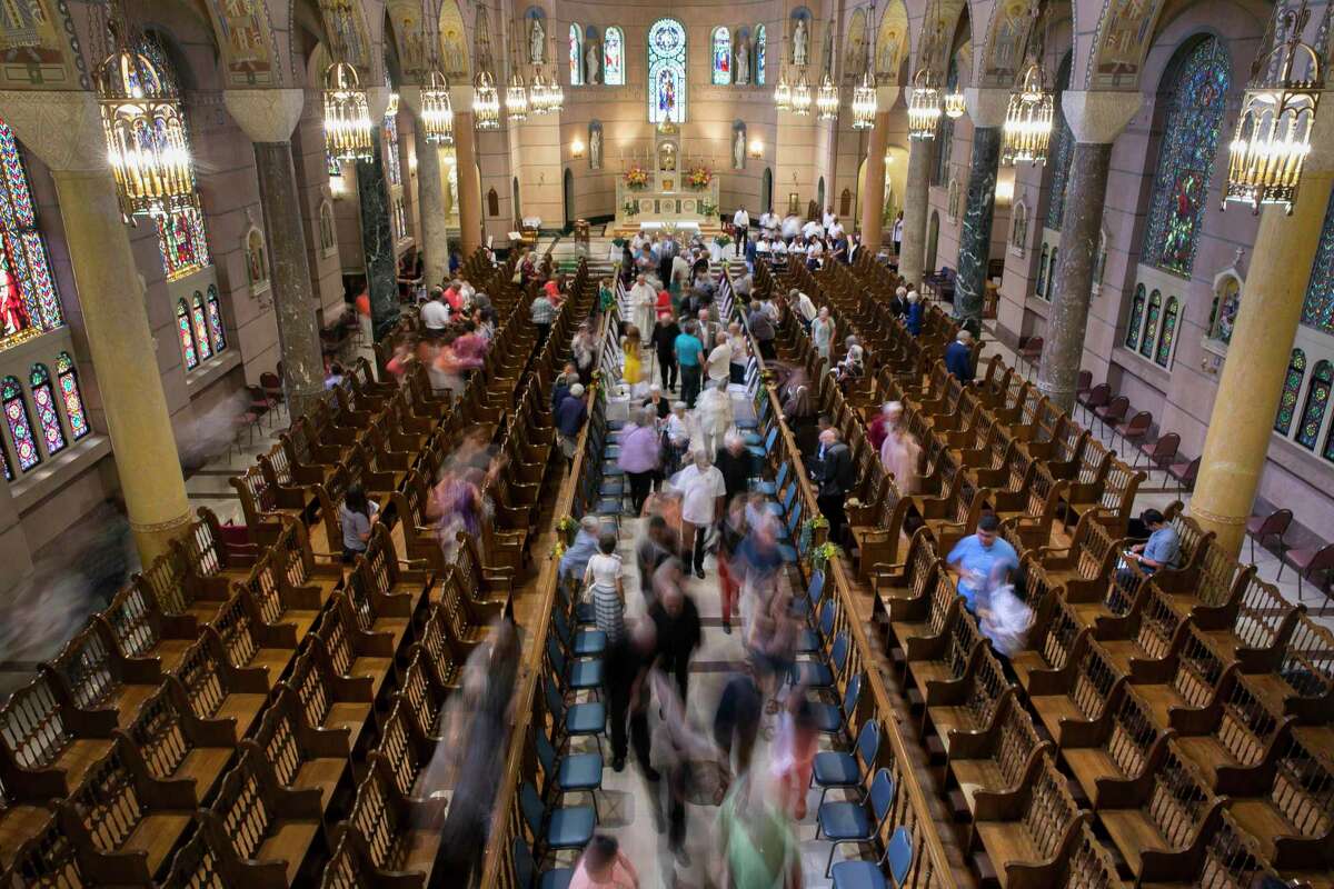 Attendees slowly exit after the World Day of Prayer for the Care of Creation event at Villa De Matel Chapel on Saturday, Sept. 7, 2019, in Houston. Houston faith leaders from Catholic, Lutheran, Methodist, Episcopalian, Unity, Baptist, Evangelical and Serbian Orthodox churches gathered to address ecological crisis and climate change.