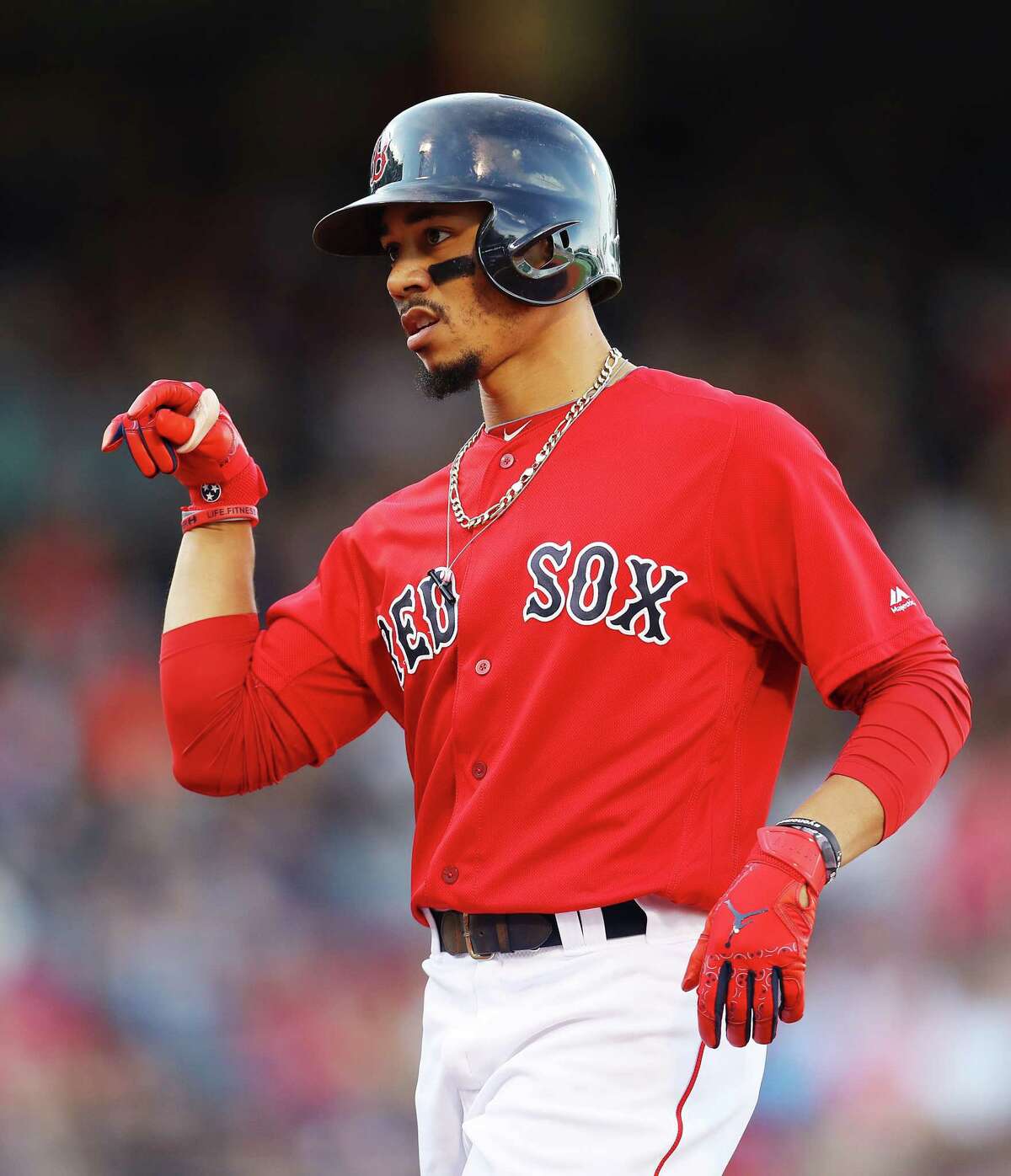 BOSTON, MASSACHUSETTS - SEPTEMBER 29: Mookie Betts #50 of the Boston Red Sox celebrates after hitting a single during the third inning against the Baltimore Orioles at Fenway Park on September 29, 2019 in Boston, Massachusetts. (Photo by Maddie Meyer/Getty Images)