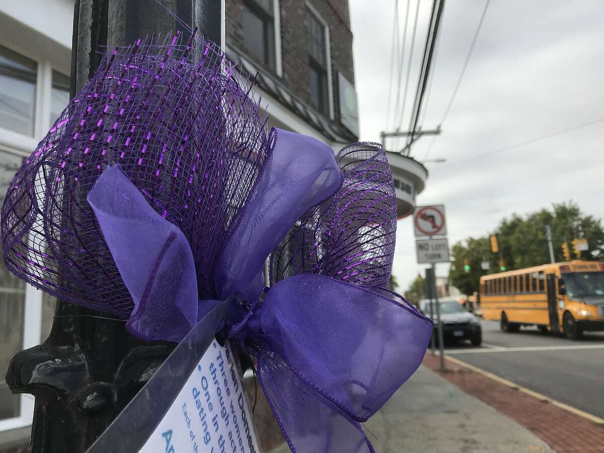 The Darien Domestic Abuse Council hung 40 purple ribbons around town this week. October is Domestic Violence Awareness month.
