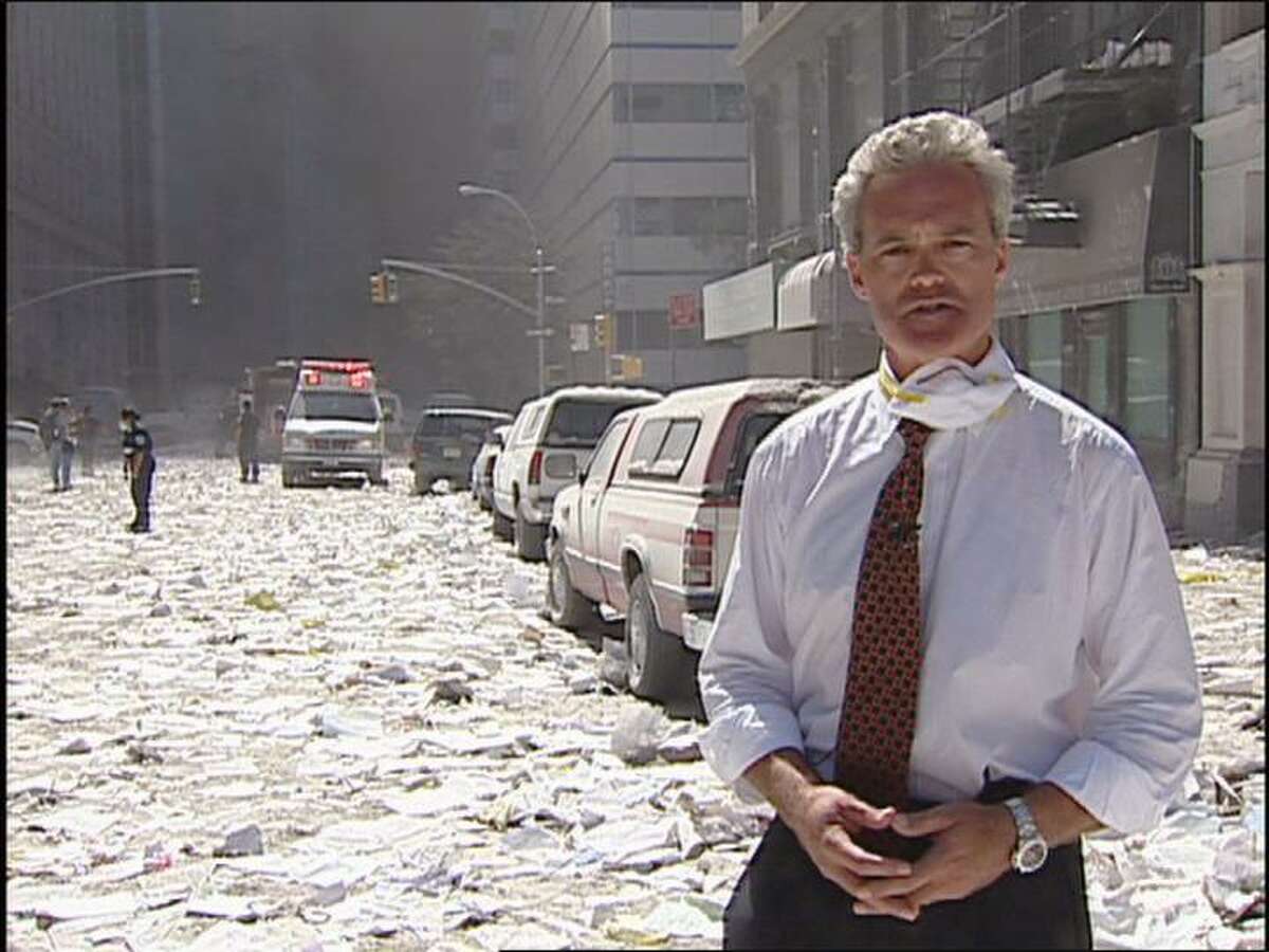 Scott Pelley reporting from Ground Zero for CBS after the attacks on the World Trade Center on Sept. 11, 2001. Pelley will discuss his career and his memoir, "Truth Worth Telling," at Wilton Library on Oct. 17.