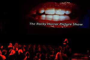 People start to take their seats before the Jefferson Theatre's showing of the cult classic "Rocky Horror Picture Show" on Friday evening. Photo taken Friday 10/28/16 Ryan Pelham/The Enterprise