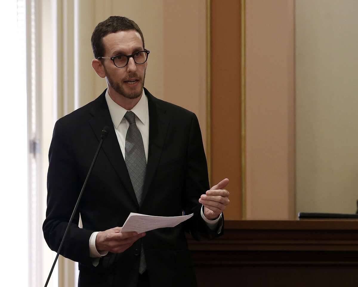 Democratic state Sen. Scott Wiener calls on lawmakers to reject a measure to tighten the rules for children under 13 using social media, during the Senate session at the Capitol in Sacramento, Calif., Thursday, Sept. 12, 2019. Wiener says the bill would harm LGBT youth who live in abusive households by isolating them from others like them. The Senate approved the bill AB1138 and sent to the Assembly. (AP Photo/Rich Pedroncelli)